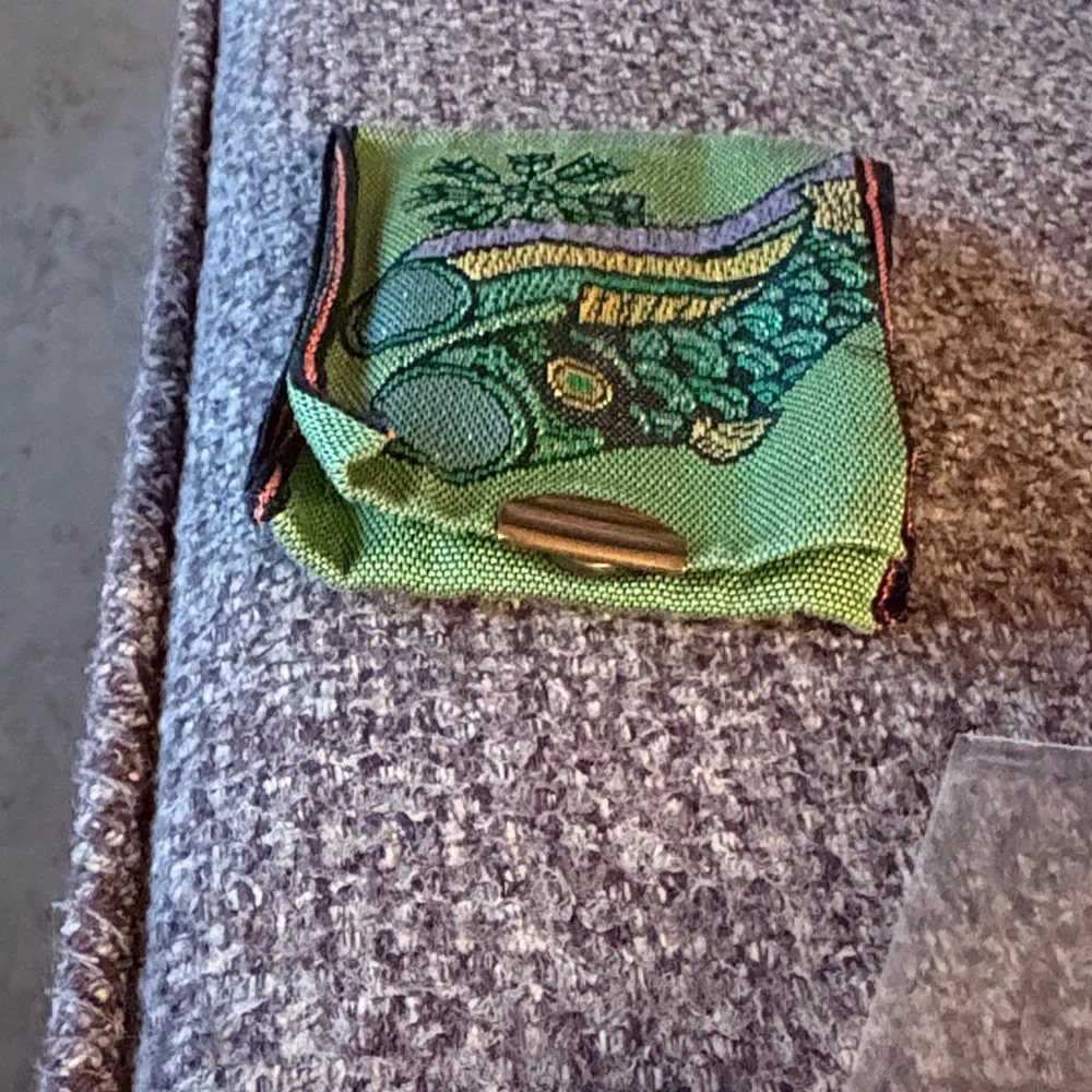 Green Embroidered Fabric Pouch for coins. Made in Japan. Recycled materials.